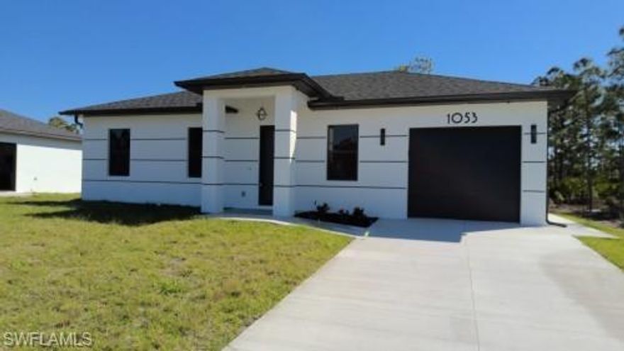 NEW CONSTRUCTION!! PRIME LOCATION!! 4 minutes drive to 7 Eleven and 82 RD, making errands quickly and essay. This home is impeccably designed and built with attention to every detail. All lights throughout the home are LED, all doors and windows are high impact and includes a sprinkler system. The open floor plan seamlessly blends indoor & outdoor living. Impeccable white 36x36 porcelain title floors with membrane under tile, which prevents cracks from wear and tear. Expansive living room with high 8" interior and exterior doors. The kitchen boasts gorgeous 42" solid wood soft close cabinets with quartz countertops, a broad counter height island along with stainless steel appliances. This home is approximately 10 minutes' drive to the main shopping centers, restaurants and retail areas, THE BEST SW FLORIDA CAN OFFER