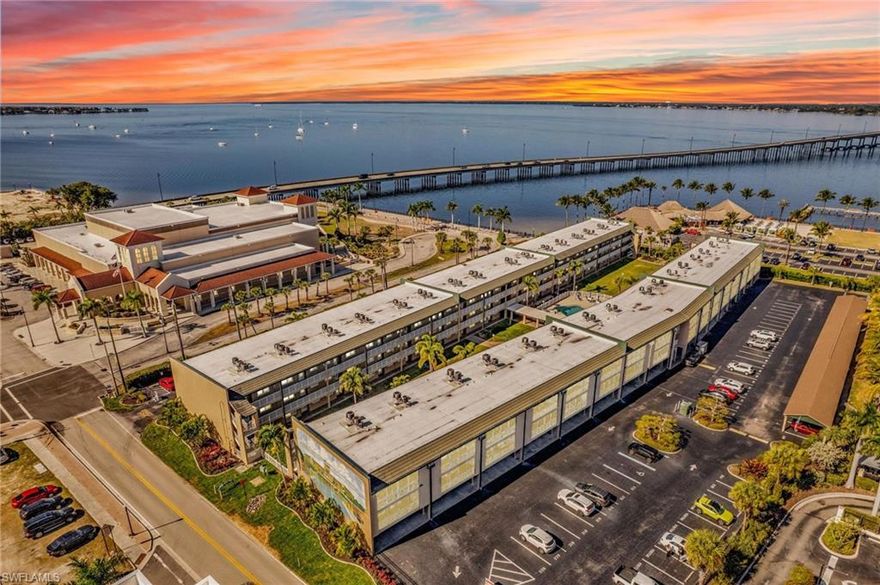 Discover the joy of relaxed waterfront living in one of Punta Gorda’s most beloved 55+ communities. Set along the shores of Charlotte Harbor, this second-floor corner residence in the Charlevoi Condominiums offers an unbeatable location paired with a welcoming, active lifestyle. Designed for comfort and ease, this 2-bedroom, 2-bath condo features a light-filled layout and an inviting east-facing screened-in lanai, the perfect place to unwind in the evening. Not only are there new floors throughout the entire home, but the kitchen is both functional and social, offering a pantry, appliances, and a breakfast bar that keeps you connected to the living and dining areas. The primary suite provides a comfortable retreat with dual closets, including a walk-in, and a private redone bath. The home has a generously sized guest bedroom with its own full bath ensures visitors enjoy both space and privacy. Beyond your front door, Charlevoi delivers true resort-style living with a heated pool, fitness room, card room, covered outdoor patio, and a large community space for events and meetings. Best of all, you’re just a short stroll from downtown Punta Gorda’s dining, activities, and a 2.5-mile path that showcases the beauty of the harbor. This is a turn-key listing and everything will stay. Book a showing and come see your new home today!