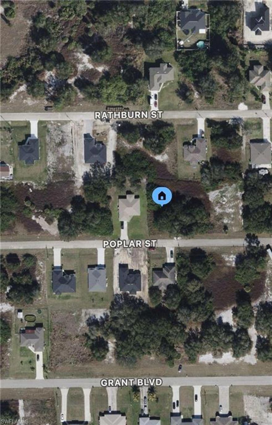Great lot in Lehigh Acres! Next to a newer home. Paved road and electric at the curb. Parcel has good elevation and is surrounded by newer homes! Excellent opportunity. Owner has multiple parcels in this same neighborhood. Financing available. Hablo Español!