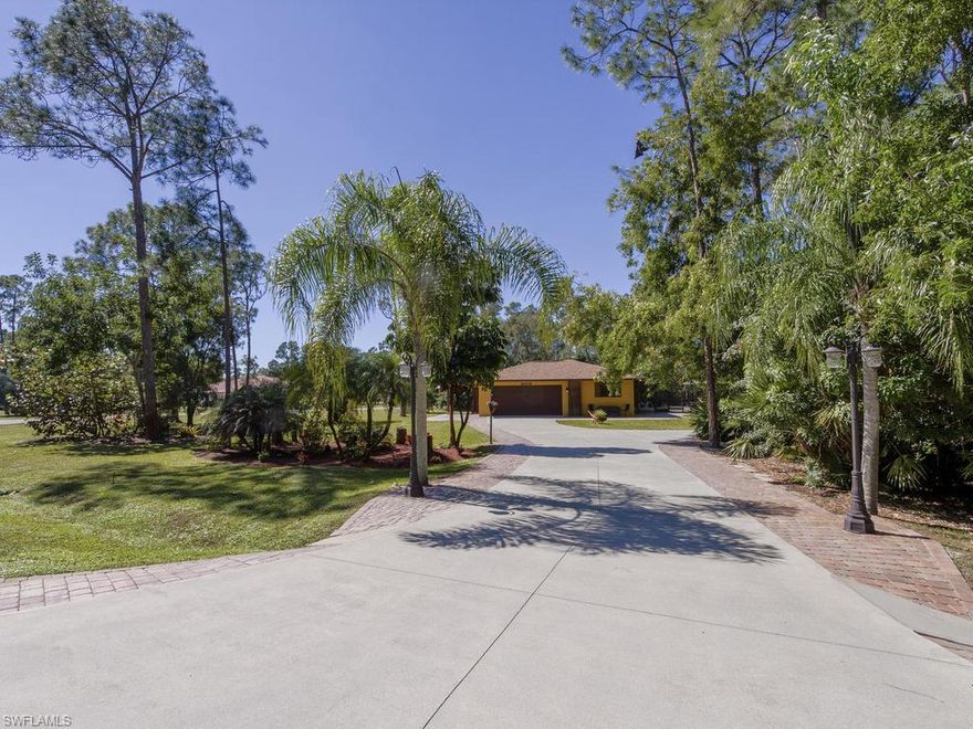 Gorgeous Colonial Courtyard Estate set on a 1.25 acre, Landscaped corner lot, with 450 ft of direct road frontage. This 4 bdrm, 4 bath Pool home, (Completely renovated) with Attached Garage, offers the discriminating buyer the opportunity to live work and play while enjoying a Serene country village atmosphere. At home you can entertain your guests friends and family in the privacy and peace of this wonderful Green Courtyard setting.  Magnificent Pines, Oaks, Citrus and natural gardens surround this country home. Nestled in this setting you will find five social areas. Your own Movie theater with kitchen, and refrigerator to host your Children's or family's guests and parties. A large business office equipped with desks, computers, cable, fax and files. A Music Studio  with full bath which can easily be converted into a Guest or Mother in Law. An outdoor Fireplace setting as well as a separate Spa and relaxation area for the Fitness, Yoga and spiritual minded. Book your private showing to see what this wonderful piece of paradise can offer your family plus the serenity of this community's  
Private lifestyle. RV's,Horses and Fun are welcome! NATURE GALORE! VirtTour has extra pics!