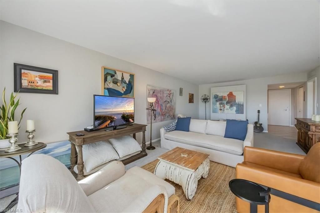 Photo of 3410 Gulf Shore BLVD N #302, NAPLES, FL 34103 (MLS # 225079047)