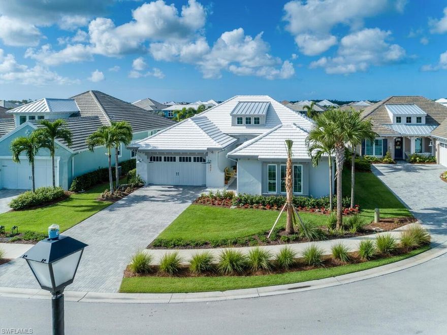 Rarely available on Pembroke Way, AWARD WINNING Jasmine Grande with MANY UPGRADES is move in ready! Overlooking an oversized custom built pool and spa with western exposure allows spectacular sunset skies from a large extended lanai which includes an outdoor kitchen, Uline ice maker and refrigerator, Lynx grill, a "picture frame" screen enclosure, tropical landscaping, perfect for entertaining! Upgrades also include a gremicidal air purifier, reverse osmosis water filtration system, custom cabinetry throughout! Lots of additional interior and exterior LED outdoor lighting, interior and exterior electronic window and storm shades, custom window treatments in living room, high tech security and speakers, beautiful hard wood flooring in master bedroom and main living areas, high end plumbing fixtures and faucets and all Smart TV's remain in the home! ALL IMPACT glass sliders and windows. Walking distance to the Isles Club and Spa and Riverfront Overlook Grill! A MUST SEE! Truly a gem!