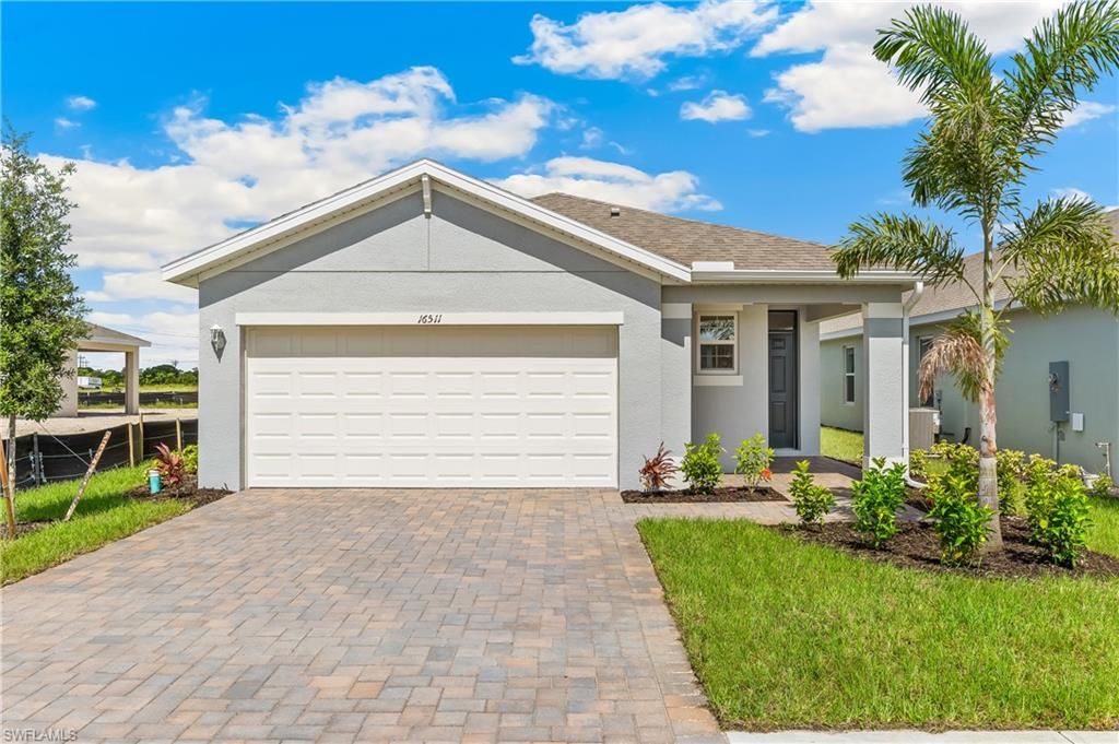Photo of 1221 BROOKLANDS DR, FORT MYERS, FL 33905 (MLS # 225084142)
