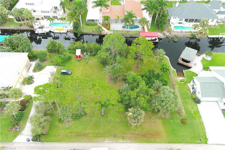 Superb 0.37 acre waterfront lot with gulf access! Located on a quiet street just East of Tamiami Trail and West Terry Street intersection. This lot boasts 133 feet of canal frontage. Build your dream home with a spectacular view! Just minutes to I-75, Tamiami Trail, Bonita Beach Park, world famous beaches and numerous restaurants, stores, entertainment and much much more!