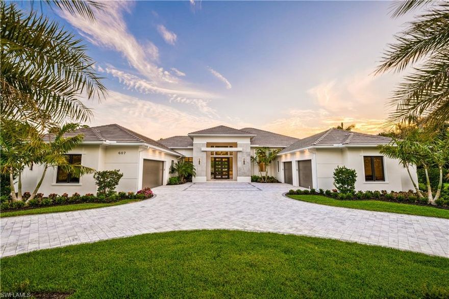 This gorgeous one-of-a-kind custom Stock Home home is perfectly located in the heart of Central Naples in sought after Pine Ridge. The home features exquisite interior finishes by Richard Guzman, of R.G. Designs Inc. The very open floor plan with tandem 2-car garages features an amazing glass wine room at the foyer for entertaining and an outdoor area built for entertaining which is second to none. Flooring is a beautiful blend of stucco and porcelain tile cladding with decorative synthetic wood. The custom estate is elegantly furnished by Wilfredo Emanuel of Wilfredo Emanuel Designs leave nothing to be desired.  The residence presents a worldly look with clean lines while still embracing a relaxed coastal elegance. The Chef’s kitchen, fire features, outdoor cabana lounger and spectacular southwestern exposure adds to the perfect resort-style experience.