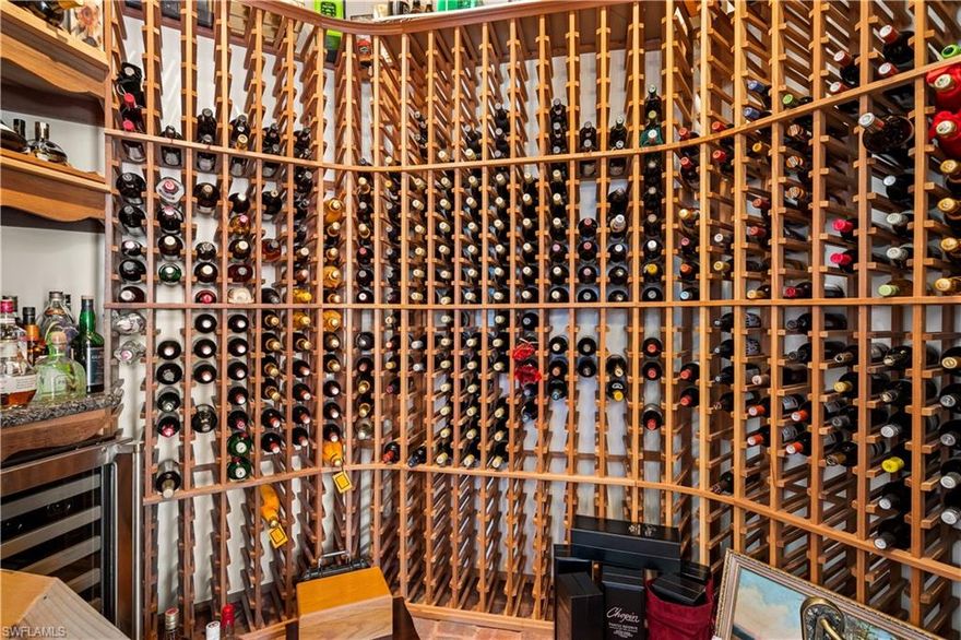 One of a kind courtyard estate home in Gulf Harbour Yacht & Country Club. Golf membership available for separate purchase. Walk thru the Pecky Cypress doors and enter your outdoor paradise. 6BR, 6 Full baths & 2 half baths, 6593 sqft living space, 4 car garage, and golf cart garage. New roof in 2022. 35KW generator. Expansive pavered pool area with swim up bar, spa, fireplace, & teak ceiling. Outdoor kitchen offers granite counters, icemaker, fridge, & Viking BBQ. Second floor bonus suite with kitchenette, bath, steam room and balcony overlooking courtyard. First floor sauna room. Etched glass doors lead into impressive living space with 12ft zero corner doors. Chef’s kitchen is a dream with custom wood cabinetry, granite counters, double oven, Viking stovetop w/ dual griddles, warming drawer, Subzero fridge, walk-in pantry. Butler pantry with access to formal dining area. Granite countertop bar with icemaker, sink, & fridge. Main living space features unique octagon pecky cypress ceiling. Office with views of 4th fairway. All doors are mahogany. 900 bottle wine cellar. 4 ensuite bedrooms. Be sure to watch the immersive walk-thru video!