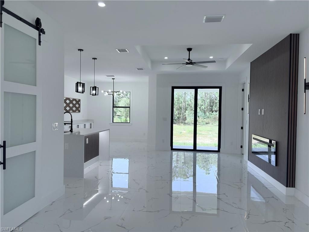 Photo of 1503 Calvin AVE, LEHIGH ACRES, FL 33972 (MLS # 225077909)