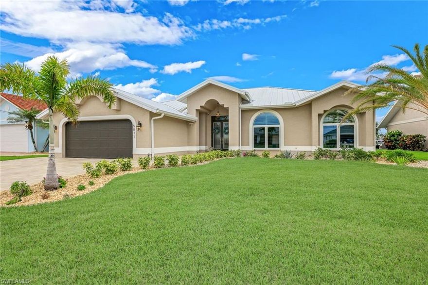 Located in the highly sought-after SW Cape Coral area, this Gulf-access pool home offers stunning wide lake views and is perfectly positioned on a quiet cul-de-sac—delivering both privacy and one of the most desirable waterfront settings in the area.

Offering over 2,050 sq. ft. under air, this meticulously maintained home features a bright and spacious great room with soaring cathedral ceilings, custom built-ins creating an open and inviting feel. The updated kitchen includes new appliances, and a new A/C system adds comfort and efficiency.

Designed for peace of mind, the home is equipped with hurricane impact windows along with roll-down shutters for added protection. Step outside to your expansive outdoor living space and enjoy breathtaking sunrise views over the water. The brand-new pool cage spans the entire width of the home—perfect for entertaining or relaxing year-round.

Boaters will love the composite dock and quick, direct Gulf access, making this a true waterfront lifestyle property. Additional upgrades include a standing seam metal roof, new paved driveway, and a new garage door, new pool heater and plantation shutters. The home has been meticulously maintained and shows pride of ownership throughout.

Just minutes from Cape Harbour, Tarpon Point, waterfront dining, shopping, marinas, and everyday conveniences, this location offers the perfect blend of lifestyle and accessibility.

Wide water views, prime location, and quality upgrades—this is Southwest Florida living at its best.