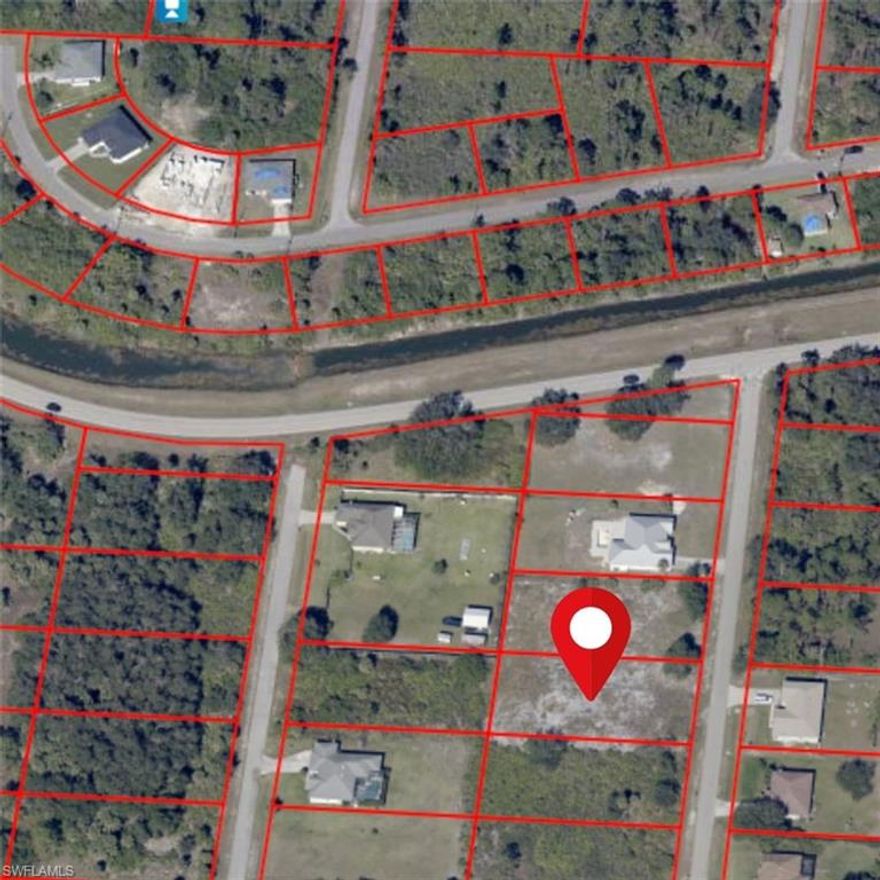 Discover the perfect canvas for your dream home at 1115 Wagner AVE. Spread across a generous half-acre, this vacant plot promises unparalleled potential for visionaries and developers alike. Nestled in a rapidly growing region of Lehigh Acres, this land offers not just space but a golden opportunity to capitalize on the area's dynamic expansion.

With its serene surroundings, this location strikes the perfect balance between the tranquility of suburban life and the energy of a booming neighborhood. From new residential communities to commercial developments, Lehigh Acres is witnessing a transformative phase, making now the optimal time to invest.

Whether you envision a luxurious family residence, a sprawling garden oasis, or any architectural masterpiece, 1115 Wagner AVE awaits your touch. Dive into the realm of possibilities and lay down the first brick of your future in the heart of Lehigh Acres. Don't miss this rare chance to own a piece of the future in one of Florida's up-and-coming locales.  Property next door at 1117 Wagner also for sale.