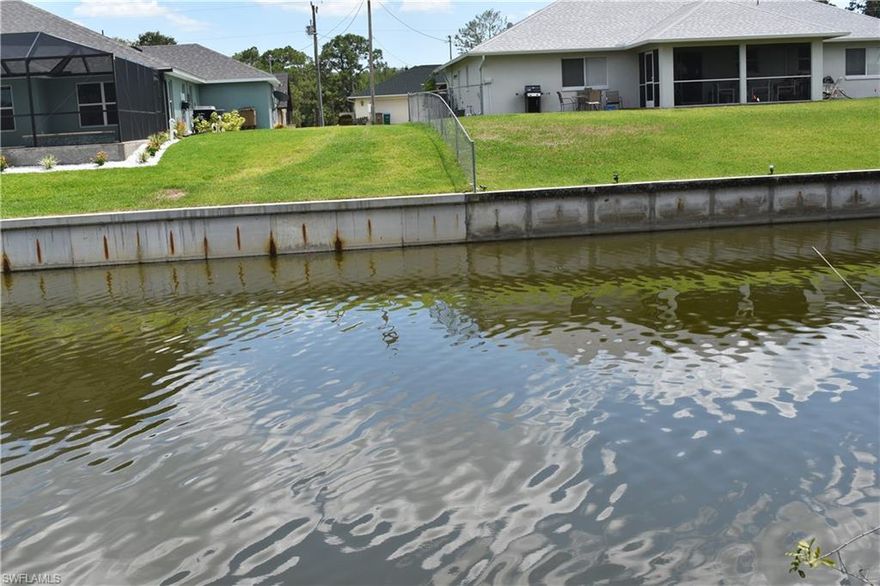 Southern exposure canal front property available now near Palmetto Pines Golf Course in SW Cape Coral FL.  This lot has city utilities available which include city water, city sewer, and irrigation.  There is a small assessment balance remaining. Great location to build a new home and enjoy all the Cape Coral Florida has to offer.