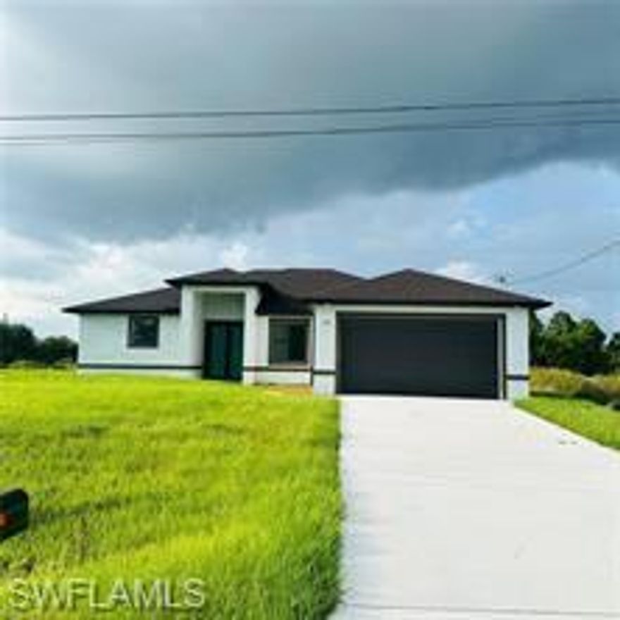 One or more photo(s) has been virtually staged, AI generated or rendered.  Luxurious home in the best area of Lehigh. This home offers more than any other property and all for an incredible price. 4 bedrooms, 2 spectacular bathrooms, impact windows, ceramic floors throughout the house, high ceilings make it look more spacious. Kitchen with classic white marble counter, white cabinets, stainless steel appliances. Two spacious garages with a side door for multipurpose use. In the back there is a very large covered concrete terrace, spacious to enjoy barbecues, watch games on TV , movie nights, etc. It could also be transformed in the future into a huge room, family room, or whatever the imagination wants. Latest generation septic tank and much more. We have a Lender that has many different loan programs for every need. Do not think that you cannot qualify to buy a house, better consult us and we will guide you so that you can go to the right place towards the purchase of your property. We have a large list of homes under construction in the same area of Lehigh. Call us for a free consultation. Hablo espanol.