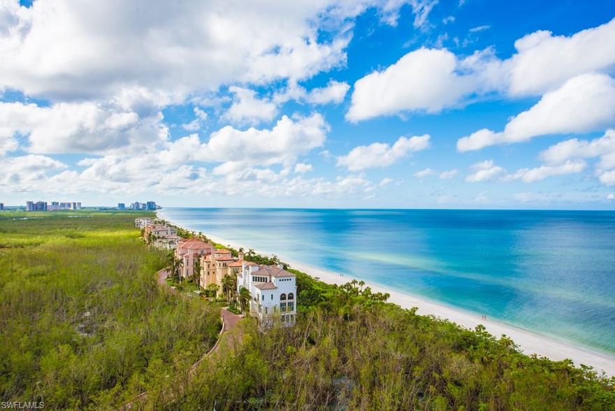 C.13848 - Not just any view, it’s THE view! A front row seat to a stunning backdrop of beach, Gulf, blue sky and preserve begins when you enter this luxury residence. Two premium adjoining condos were beautifully crafted into one 6,121 total SQ. FT elegant floorplan offering unparalleled flowing space, unobstructed views and privacy. The 4 bedrooms, (2 Master Suites) and 4-1/2 baths are finished with top of the line materials and craftsmanship following intelligent design. You’ll fall in love every day when you come home to the comfort of a soothing coastal palette, marble flooring, artisan woodwork, Venetian plaster, glass doors PLUS 2 large wrap around balconies and several Juliette terraces; as well as 2 storage lockers and 4 indoor parking spaces.  The Contessa, with all new impact windows demonstrated its superiority with Irma. This beautiful high-rise was only one of the few buildings in Bay Colony that sustained zero damage. So come enjoy Bay Colony’s private beach club located on 2 1/2 miles of pristine sandy beach, attended beach front services, 3 active tennis clubs, fitness and wellness centers; just steps away from the Ritz Carlton, Artis, and Waterside shops!