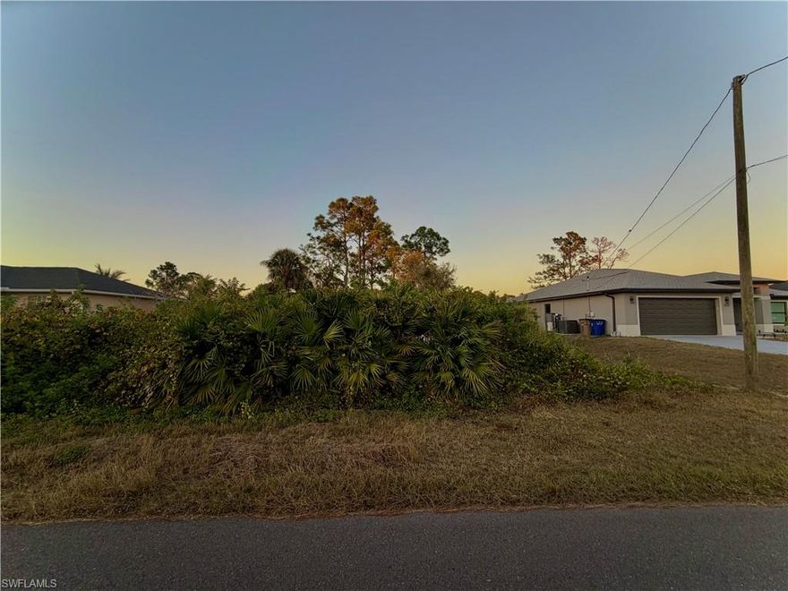 GREAT LOCATION in the HIGHLY DESIRABLE SW side on a quiet paved street with utilities! Just minutes from major amenities with a quick commute to Fort Myers! Come build your DREAM HOME or INVEST today!