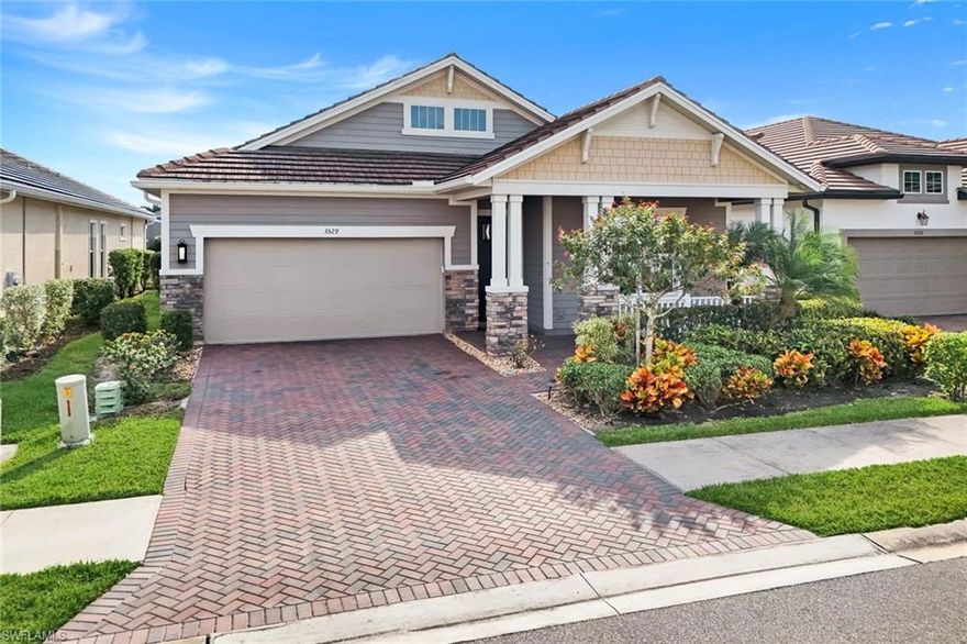 MOTIVATED SELLERS! Rare opportunity to own like-new construction in North Naples! This craftsman-style home offers charm and premium south-facing lake with fountain views from all of its extended back lanai. Built in 2020 and very well maintained, the home features a chef’s kitchen with upgraded cabinets and a stunning open layout designed for everyday living and indoor/outdoor entertaining.

The welcoming front porch leads into a bright entry with high ceilings. Two guest bedrooms and a full bathroom are positioned toward the front of the home, offering separation from the main living areas. The open-concept chef’s kitchen includes premium cabinetry, a large bar seating area, walk-in pantry, serving space, updated light fixtures, and connects seamlessly to the main living and dining areas.

The den includes fully opening glass doors and provides flexible use as a home office or additional living space. The primary bedroom suite features a luxurious spacious shower and a walk-in closet. Sliding doors open to an extended, no-see-um screened lanai offering outdoor living space with water views and added privacy.

Accordion and motorized shutters provide storm protection with quick closure. The home is conveniently located within walking, biking, or golf-cart distance to Founders Square, with restaurants, fitness options, medical offices, and retail nearby. Compass Landing amenities include a pool and spa, clubhouse, fitness center, event space, locker rooms with showers, and a covered playground, along with low HOA fees and an active community calendar. Some photos include reality renovation/reality staging. This property includes interior design services, making furnishing this property easy for your buyer.