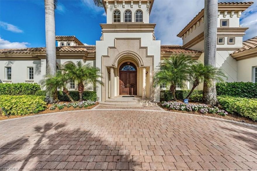 H4301 - Bask in beautiful sunrises and glittering lake views from this generously appointed estate home situated on one of the prettiest locations in Quail West. The ideal floor plan offers a superbly oversized kitchen with huge island, gas cooktop, meandering counter space with ample seating, a large pantry and additional butlers pantry adjacent to the spacious dining room area. Soaring tray ceilings and walls of windows bring the outdoors in. 
All 4 en suite bedrooms plus a den/library with built ins are just a few of the custom upgrades you will enjoy. The formal living room features spectacular views while enjoying the lovely floor-to-ceiling fireplace and the family room/great room is perfect for hosting gatherings both small and large. The attached garage with
adjacent work room offers plenty of space for your vehicles and toys. The spacious lanai features a screened area for relaxing, pool, spa and amazing views! Includes House membership with assessment fully paid. Quail West is ideally located just a short drive to to the Gulf and beaches,  shopping, restaurants and more.