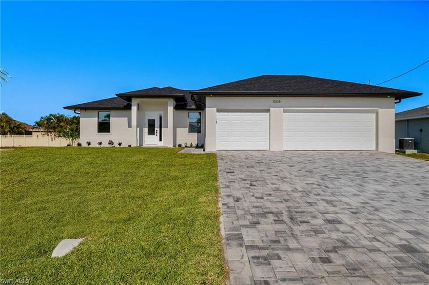 NEW CONSTRUCTION HOME ready for move-in. Welcome to this spacious 4 bedroom, 2 bath pool home in a very desirable neighborhood of higher end homes in Cape Coral. This home comes with a HEATED SALT WATER POOL with an enclosed pool cage. The home features vaulted ceilings in the living room, dining room, and kitchen area with 9ft. 4 inch ceilings throughout the rest of the house. All countertops throughout the home are BEAUTIFUL QUARTZ with an elegant design. The center island is QUARTZ with 2 waterfall edges. The center island is designed as a pull up bar for dining. All the appliances in the home are stainless steel upgraded above a typical builder grade appliance package. The master bathroom and the second bathroom have elegant tile designs along with fully enclosed glass enclosures. The outdoor pool area is a 12 x 24 SALT WATER HEATED POOL with a sun shelf. There is over 750 sq. ft. of outdoor living area for entertaining guests or just relaxing by your pool. You will also enjoy privacy while relaxing by the pool as well. ALL WINDOWS AND DOORS ARE IMPACT RESISTANT. So, no need for shutters. The home comes with a FULL HOUSE REVERSE OSMOSIS SYSTEM as well. The home comes with a FULLY AUTOMATED LAWN SPRINKLER SYSTEM as well. The home comes with a spacious 3 car garage for your vehicles and/or extra storage. The home has a full SECURITY SYSTEM along with 4 SECURITY CAMERAS which can be viewed from your smart phone. You will not be disappointed. Book your showing today!