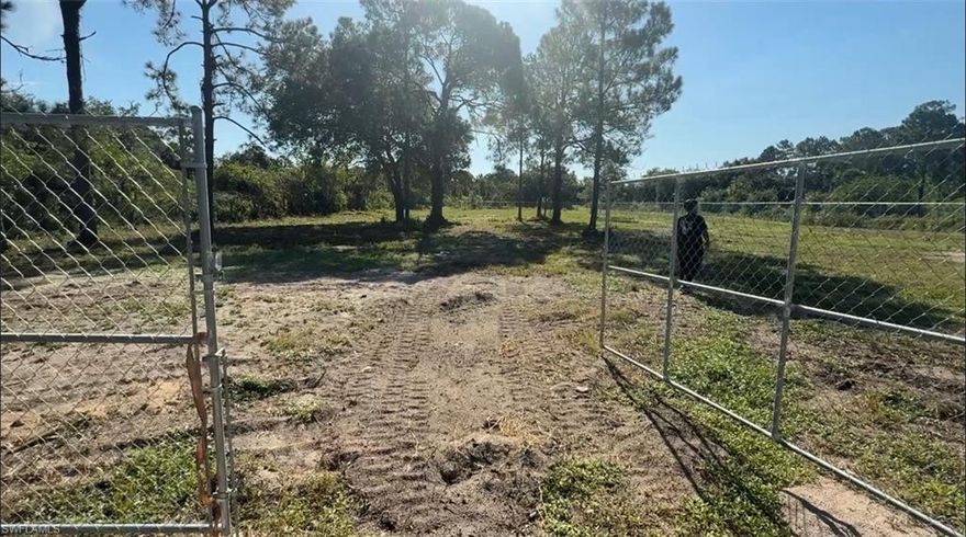 Spacious 1.25-Acre Corner Lot in Montura Ranch Estates. Discover the perfect blend of privacy and open space with this 1.25-acre corner lot, located at the end of the road. The property is fenced, cleared, and clean, ready for your vision. Zone Residential/Agricultural - offering versatile use and equestrian-friendly living. Private water well already on site. Build your dream home or create a serene gateway in this peaceful community with your own canal view.