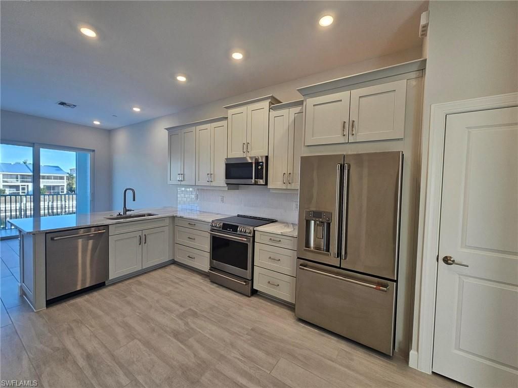 Photo of 1623 Sea Haven DR #304, PUNTA GORDA, FL 33950 (MLS # 226005538)