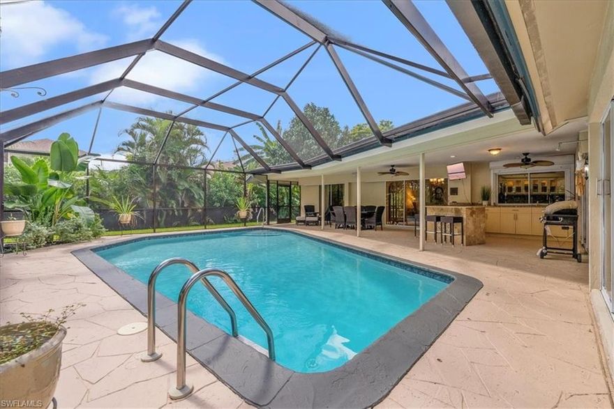 Discover the charm and elegance of this exquisite Kings Lake residence, meticulously designed for comfort and style. This inviting home offers three generously sized bedrooms, each boasting walk-in closets, and two large, modern bathrooms. The oversized two-car garage provides ample storage and convenience. At the heart of the home is a spacious family room, complete with a cozy wood-burning fireplace, perfect for creating lasting memories. Step outside to your private pool oasis, where a newly installed heater ensures year-round enjoyment. Entertain effortlessly in the large outdoor kitchen, equipped with a separate barbecue grill, ideal for al fresco dining. The pool area is further enhanced by a freshly resodded lawn and a beautifully laid paver patio, perfect for outdoor gatherings. Inside, freshly painted interiors add a touch of elegance, complemented by a newly installed roof and a new paver driveway. Situated in the desirable Kings Lake community, this home offers minimal HOA fees and an unbeatable location. Enjoy the tranquility and convenience of being just a short drive from downtown Naples, fine dining, beautiful beaches, and all the attractions Naples has to offer.