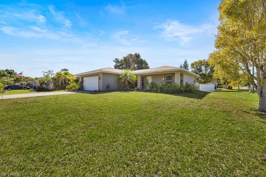 Welcome to Fort Myers Shores! Calling all first-time homebuyers and investors! No flood insurance needed at this well maintained 3 bedrooms, 2 bath home! Large, oversized corner lot with a fenced in back yard for entertaining! Plenty of space in your 2-car garage for your vehicles! Tile throughout main living room, kitchen and bathrooms! Newer carpet in the bedrooms! The kitchen is open to the living room for ease and has a large pantry, plenty of cabinets and brand-new granite countertops and stainless-steel appliances. The washer and dryer are conveniently located inside with a large storage closet for all your cleaning supplies. All bedrooms have ample closet space, and the primary bedroom has a large walk in. The primary bedroom features an en suite bathroom with walk in shower and linen closet. This home has been well taken care of with only 2 owners! High and dry without any hurricane damage! New roof put on June 2022! Located close to restaurants, shopping, grocery and lots of entertainment! Make your appointment today!