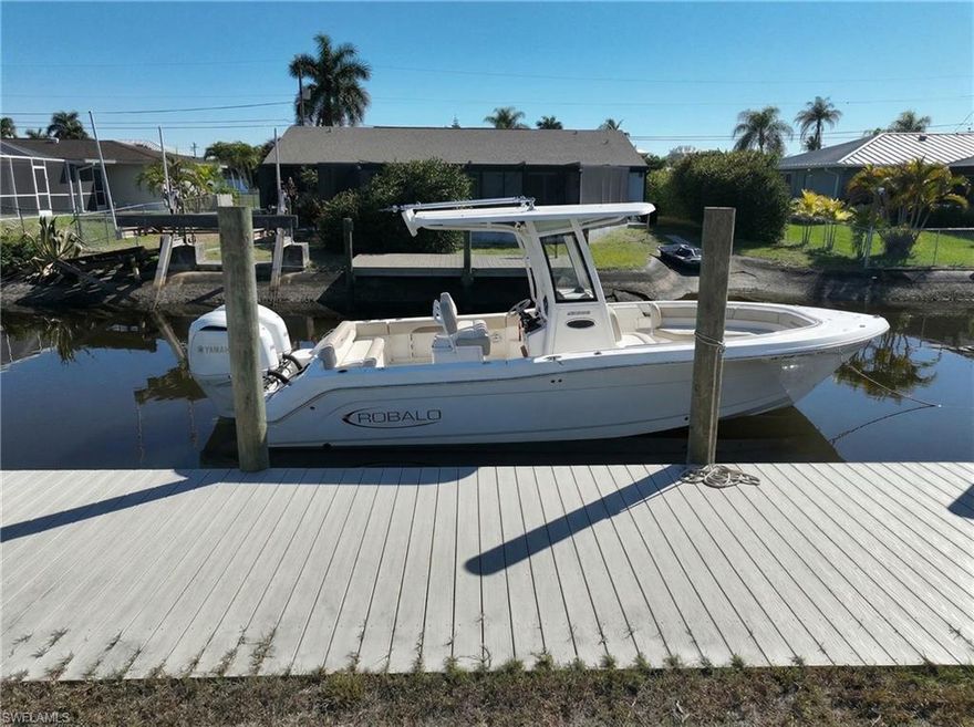 One or more photo(s) has been virtually staged, AI generated or rendered.  Brand new $60,000 Seawall and Dock Installed ready to build your waterfront dream home. One or more photo(s) has been virtually staged, AI generated or rendered.  Build your Southwest Florida dream home on this prime canal-front lot located in the desirable Island Park area. Offering direct water access and a peaceful waterfront setting, this property is ideal for boating enthusiasts, investors, or anyone looking to create a custom coastal retreat. Enjoy serene canal views, tropical breezes, and the convenience of nearby shopping, dining, beaches, and everyday amenities. Whether you envision a modern waterfront estate or a relaxed Florida-style getaway, this lot provides the perfect canvas. Opportunities for canal-front parcels in this area are limited. Secure your piece of waterfront paradise and start designing your future today.