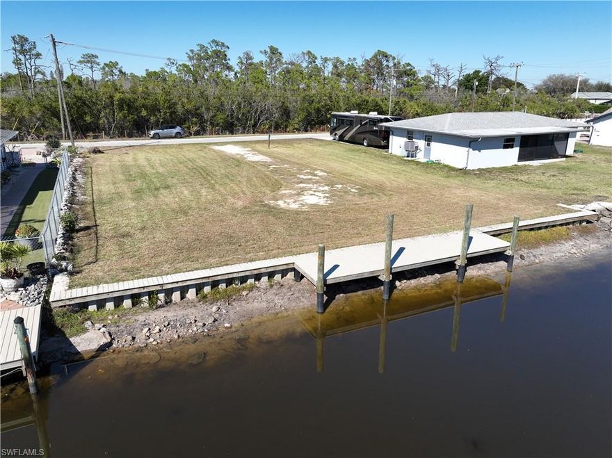 Build your Southwest Florida dream home on this prime canal-front lot located in the desirable Island Park area. Offering direct water access and a peaceful waterfront setting, this property is ideal for boating enthusiasts, investors, or anyone looking to create a custom coastal retreat. Enjoy serene canal views, tropical breezes, and the convenience of nearby shopping, dining, beaches, and everyday amenities. Whether you envision a modern waterfront estate or a relaxed Florida-style getaway, this lot provides the perfect canvas. Opportunities for canal-front parcels in this area are limited. Secure your piece of waterfront paradise and start designing your future today.
