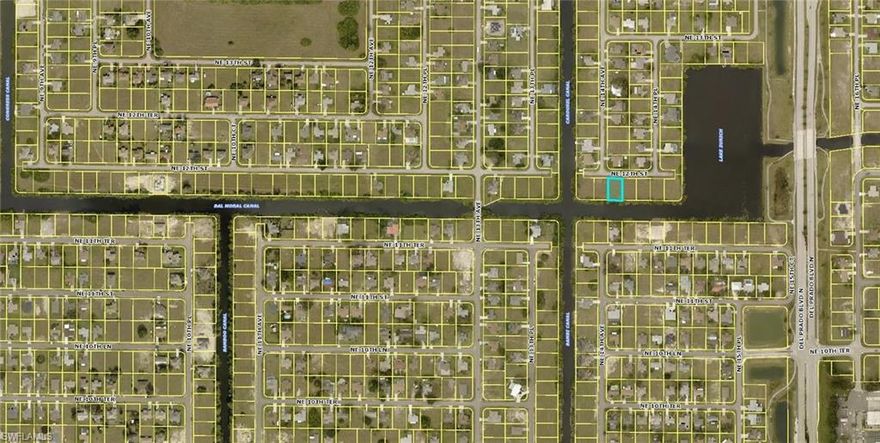 Fantastic waterfront property in NE Cape Coral.  This southern exposure property is in area of newer homes close to schools, restaurants and shopping. Adjacent lot also available for sale.