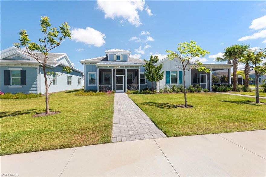 This beautifully designed Minto-built Marco Coastal Cottage offers 2 bedrooms, 2 baths, and a 2-car garage within one of Naples' most sought-after communities. Featuring soaring ceilings, transom windows, arched and beamed ceiling details, a charming front porch, and an open-concept layout filled with natural light — every detail reflects quality craftsmanship and coastal elegance.
The Isles of Collier Preserve delivers a resort lifestyle with 8 miles of kayak and hiking trails, a zero-entry resort pool, lap pool, fitness center, pickleball, tennis, bocce, and the resident-exclusive Overlook Bar & Grill overlooking the Cypress Waterway — all just 4 miles from downtown Naples. Maintenance-included living at its absolute finest.