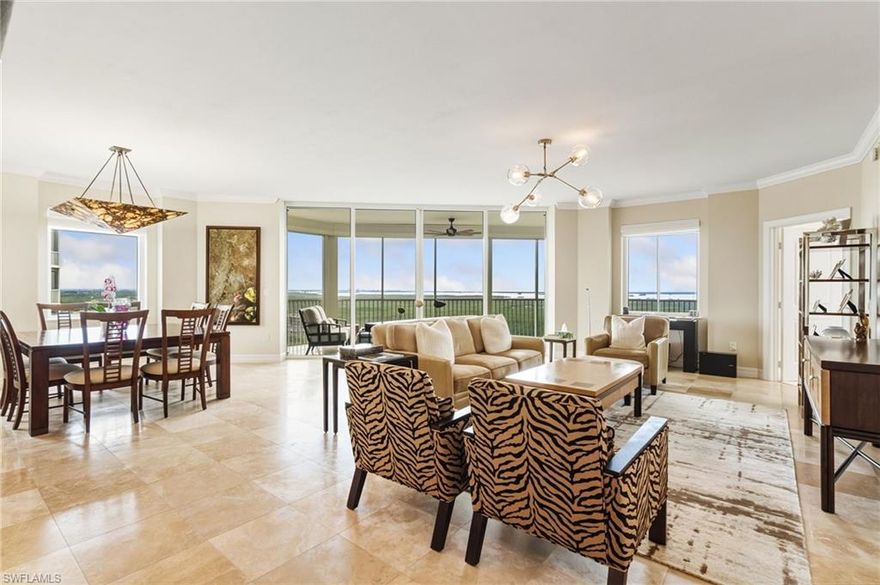 Enjoy elevated high-rise living from this beautifully positioned 16th-floor residence in Jasmine Bay North at prestigious West Bay Club. This furnished 3-bedroom, 3.5-bath residence offers expansive living space and breathtaking panoramic views of Estero Bay, the Gulf of Mexico, and serene lake and mangroves. This desirable end-unit is the largest floorplan offered in Jasmine Bay and provides abundant natural light, and sweeping sightlines from nearly every room. The open-concept living and dining areas are designed for both everyday comfort and entertaining, flowing seamlessly to spacious screened lanais where you can relax and take in spectacular sunrises and sunsets over the Gulf. The split-bedroom floor plan offers privacy for guests, while the primary suite serves as a tranquil retreat featuring generous closet space, dual vanities, and a large walk-in shower. Offered furnished, this residence is move-in ready and ideal as a full-time home or a refined seasonal escape. Also, enjoy 40 feet of automatic roll down hurricane screens. Jasmine Bay residents enjoy an exceptional collection of private tower amenities, including a stunning infinity-edge pool with spa, private poolside cabanas, gas grilling stations, a fully equipped fitness room, club and card rooms, a movie theater, and multiple guest suites for visiting family and friends. West Bay Club delivers a truly unmatched resort lifestyle. Residents enjoy a private Gulf-front Beach Club with restaurant and bar, full chair and towel service, and direct beach access. The newly renovated Bay House features a resort-style pool, yoga and Pilates studios, spinning and stretching rooms, sauna, Aqua Café for indoor or poolside dining, eight clay tennis courts, and a state-of-the-art Technogym fitness center. River Park offers Estero River access with a boat launch and Gulf access, boat storage, kayaks and canoes, a fishing pier, playground, picnic areas, basketball court, and a scenic 1.5-mile walking trail. The Sports Park includes six pickleball courts, bocce courts, a fitness lawn, and two separate dog parks. Optional memberships are available for the private 18-hole Pete and P.B. Dye championship golf course and clubhouse.