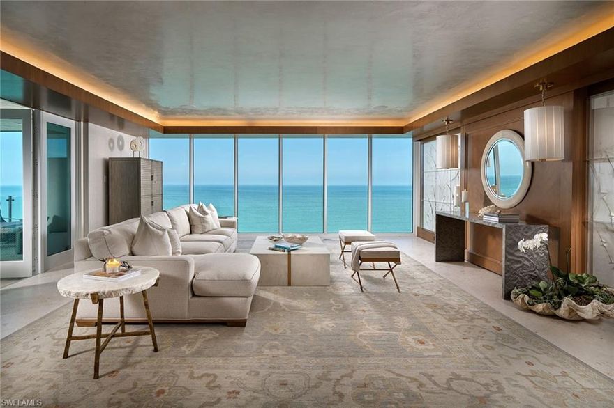 Perched on the 12th floor of Naples' most sought-after beachfront condominium buildings, this residence offers more than just a stunning remodel. Directly on the sand with sweeping southwestern views, the Gulf is your backdrop for the warm and luxuriously classic finishes throughout.  The reimagined floor plan provides space for an open kitchen with double islands opening to the great room and a covered open-air balcony. With three spacious guest bedrooms and a comfortable living area that doubles as a den with custom built-in cabinets, your guests will certainly feel at home. The serene master suite is nicely separated and offers an amazing closet and bath with stunning stonework, underlit cabinets and a walk-in shower that cannot be beaten. The new impact-resistant doors and glass complement the modern exterior glass rails adopted by the building and perfectly balance the 1,000-plus-square-foot balcony with a built-in gas grill. Seapoint at Naples Cay is a boutique-style high rise offering enclosed garages, natural gas and an understated yet elegant feel, only 28 units total.
