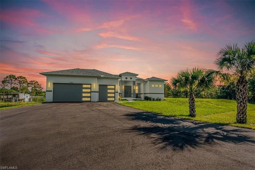 Welcome to this exceptional new construction home located in the heart of Golden Gate Estates, offering 3 bedrooms, 2 bathrooms, and an oversized 3-car garage on a private 2.27-acre lot over 300 feet set back from the road, this home offers the peace and space of estate living with no HOA restrictions. The property features a long paved driveway with a return loop, perfect for multiple vehicles, RVs, or boats. Inside, you’ll find a thoughtfully designed open floor plan with high ceilings, tile flooring throughout, and abundant natural light. The chef’s kitchen impresses with custom-made cabinetry, a waterfall quartz island, and a cozy seating area ideal for entertaining. A large laundry room with built-in cabinets, separate dining and living areas, and his-and-hers walk-in closets add functionality and elegance to the space. Oversized lanai, perfect for relaxing or hosting guests. With impact windows and high-end finishes throughout, this home delivers a perfect balance of luxury, practicality, and the freedom of estate-style living in one of Naples' most desirable and fast-growing areas.