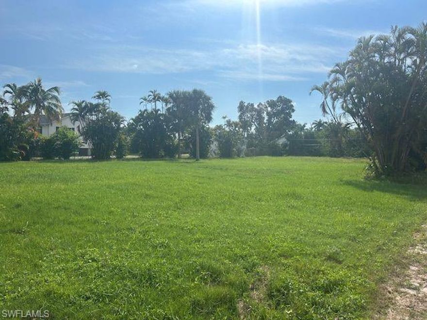 This rare, half-acre vacant parcel in the desirable Cottage Point/Iona area presents a remarkable opportunity to build your new dream home without the constraints or fees of a Homeowners Association (HOA). The property is already cleared and fully prepared for immediate new construction, benefiting from existing infrastructure including a deep well and a temporary power hookup. Situated in a very private area on a quiet, paved road, this AG-2 zoned parcel offers seclusion while providing exceptional connectivity to the best of Southwest Florida.
The outstanding location is minutes from major attractions and conveniences. You are just two miles from the Sanibel Causeway, 1.5 miles from Bunche Beach, and five miles from Fort Myers Beach. Boating and fishing enthusiasts will appreciate the proximity to the Punta Rassa boat ramp (two miles) and the Sanibel boat ramp (five miles). The area is highly convenient, with retail stores, grocery stores, and dining options within walking distance. Furthermore, the nearby development of the new Sanibel Mall promises exceptional future shopping and dining opportunities just a quarter-mile away. For travel and entertainment, RSW airport is a 25-minute drive, and both the Red Sox and Twins spring training stadiums are within a short commute. If you are looking for a prime location with ample land space minutes from the beaches, this is an unparalleled building opportunity.