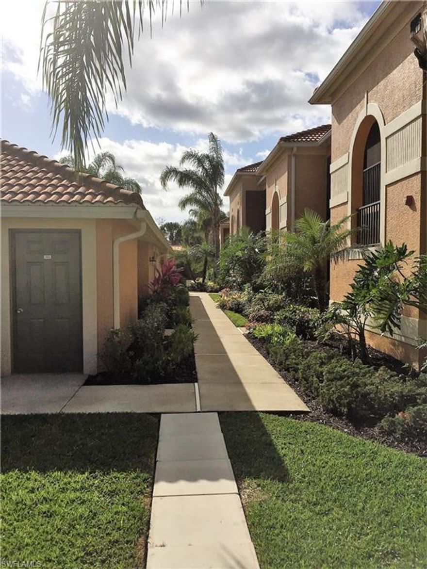 PRIDE IN OWNERSHIP!  As you walk through this immaculate 'turnkey' upper end unit veranda, you will notice the attention to detail. Bedrooms are equipped with wood flooring and plantation shutters in the owners suite.  Bathrooms were enhanced with granite counters, new sinks and upgraded polished chrome faucets.  All doorknobs and hinges were replaced with upgraded polished chrome.  Enjoy dramatic sunsets from the rear lanai in this rarely available Abbey Model in Heritage Bay with water, golf and preserve views. Heritage Bay is southwest Florida's premiere bundled country club featuring a 27 hole Lewis-Azinger designed course providing three nines artfully set out from the clubhouse allowing for play in any combination.  7 Har Tru tennis courts, resort style pool with chikki bar and an 8000 sq. ft. fitness center.  The 27000 sq. ft. clubhouse offers casual and fine dining, PGA staffed pro shop, locker rooms and a billiard room.  Membership is included and there are no initiation fees.  This is the lifestyle you have been looking for and deserve.