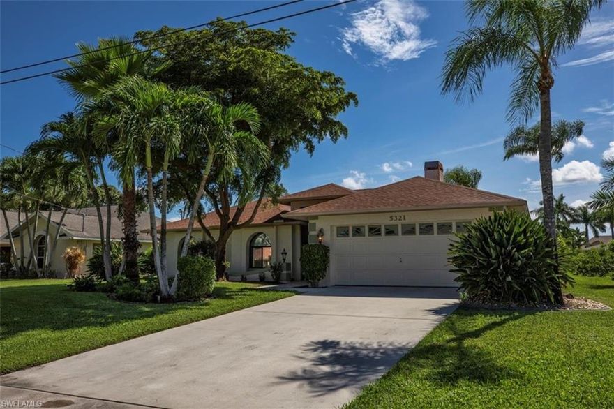Location, location, location! Beautiful pool home in one Cape Coral’s most desirable neighborhoods (Unit 64).  This home is a boater’s dream with direct sailboat access just minutes away from the sparkling waters in the Gulf of Mexico.  Gorgeous Royal Palm trees line the exceptionally well-maintained street as you arrive at your piece of paradise. When you enter the front doors, you have an unobstructed view of the beautiful heated pool, spa and canal through your expansive sliding doors.  There is a fabulous outdoor living space with a screened lanai complete with covered seating area, built-in grill and motorized storm shutters.  The walk-around dock with boat lift has a brand new canopy (June 2020).  The yard is nicely landscaped with mature palm trees. Inside, there are 2 guest bedrooms and a master suite with a soaking tub and walk-in shower, and a lovely fireplace in the great room. 
BRAND NEW A/C (May 2020), all stainless appliances are 1 year new.  Minutes away from Tarpon Point and Cape Harbor restaurants and shopping.