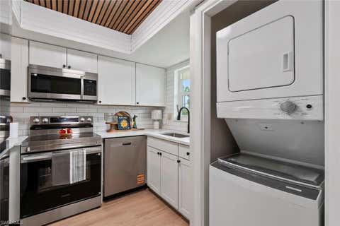 Photo of 325 Charlemagne BLVD #A101, NAPLES, FL 34112 (MLS # 226028271)