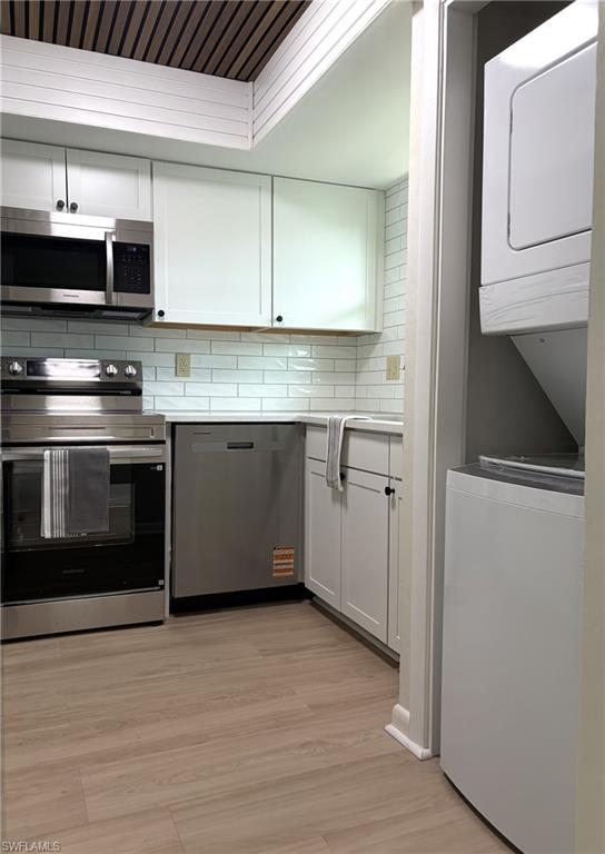 Photo of 325 Charlemagne BLVD #101A, NAPLES, FL 34112 (MLS # 226028271)