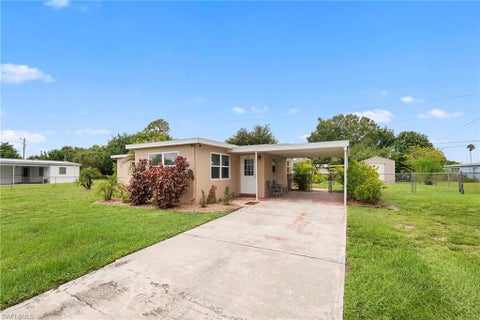 Photo of 17 Alabama RD S, LEHIGH ACRES, FL 33936 (MLS # 226028242)
