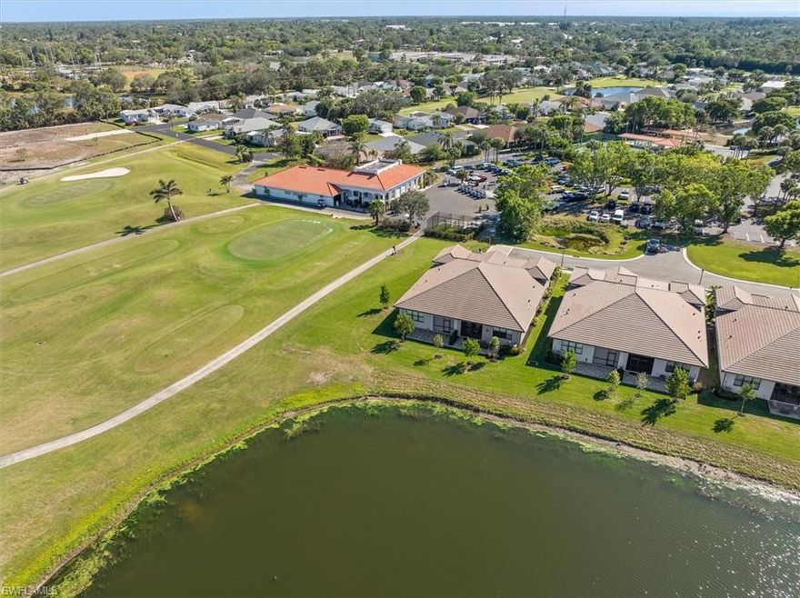 If you are looking for a virtually new end unit attached villa with a lake and golf course view - This is the one for you!
Located right next to Bonita Fairways Golf Club is this rarely available 2 plus den villa. The large great room is open to an adjoining dining area and features impact windows and slider. The lanai offers electric shutters and  peaceful lake views.
A large primary suite features a walk in closet and master bath with a walk in shower. The guest suite provides the perfect getaway for overnight guests with a view of the golf course and private bath. The well designed kitchen features stainless steel appliances with a roomy quartz kitchen counter. The home offers many upgrades such as; upgraded lighting and mirrors and plantation shutters throughout. There is also a built in pantry with a laundry room next door, with many storage cabinets and a sink. Additionally, in the attic there is plywood flooring for additional storage. Across the street is pickleball, tennis, bocce and a large community pool. The villa is easy walking distance to downtown Bonita Springs and close to beaches. Come see this villa where the living is easy and affordable at Natura in Bonita Fairways.