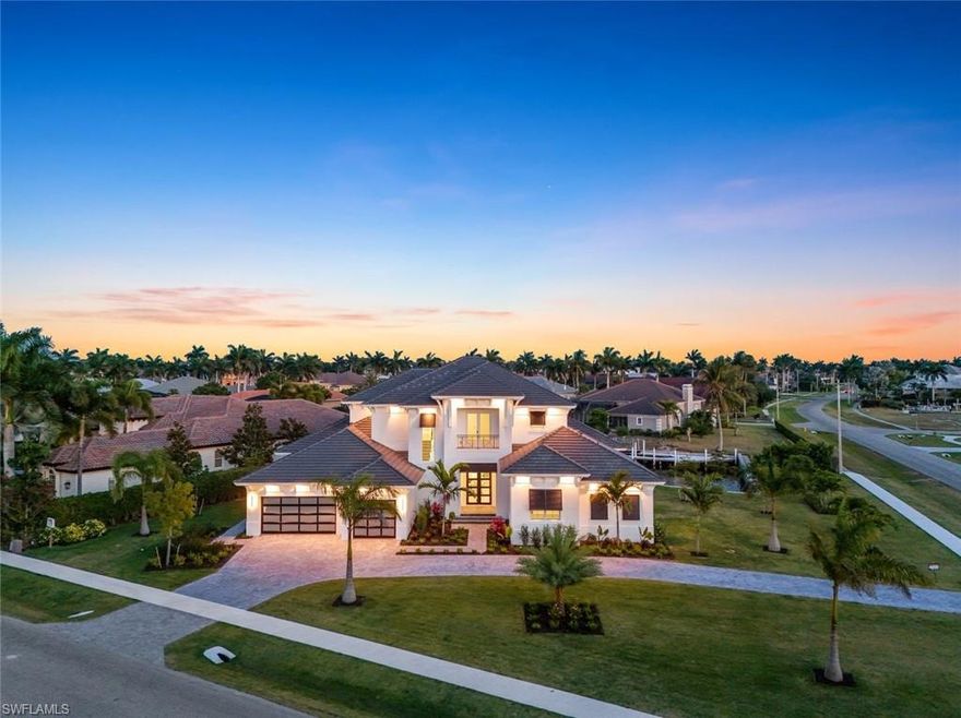 Newly Constructed Coastal Contemporary Waterfront Masterpiece!

Discover the epitome of luxury living in this brand-new custom-built home on an expansive lot with set back grounds, creating an oasis of space and greenery rarely found in today's market. This Southern exposure beauty with canal views is a water direct 10 minutes from the Gulf of Mexico. With 4 bedrooms, a dedicated office, and 5 bathrooms, 7191SF total, this residence is designed for those who demand the finest.

You'll be greeted by a grand entry foyer that leads to a spacious great room with soaring 12-foot ceilings. This open-concept space seamlessly flows into the waterfront dining area and a chef's dream kitchen, complete with a walk-in pantry. Throughout the home, you'll find exquisite fixtures and top-tier finishes, including stunning wide plank wood flooring.

Entertain with ease in the ground-level game room, equipped with a wet bar. The primary suite is a sanctuary, featuring a spa like bath with dual sinks, a soaking tub, two walk-in closets, a vanity dressing area and private study.

Upstairs, via a stairs or elevator, you'll find three more en-suite bedrooms and a loft games room with wet bar. Two bedrooms and the loft open to a covered waterfront terrace, while the third bedroom enjoys a private terrace.

Experience the beauty of the south-facing water views that stretch across the entire rear of the home, from floor-to-ceiling impact glass sliders and windows. This picturesque backdrop frames the custom tiled pool, spa and fenced yard perfectly. The covered lanai hosts a dining area, outdoor kitchen with fireplace, and conveniently connects to a pool bath. Build your dock to suit with space for a yacht.

This home is designed for discerning individuals who seek to create their own legacy on Marco Island.