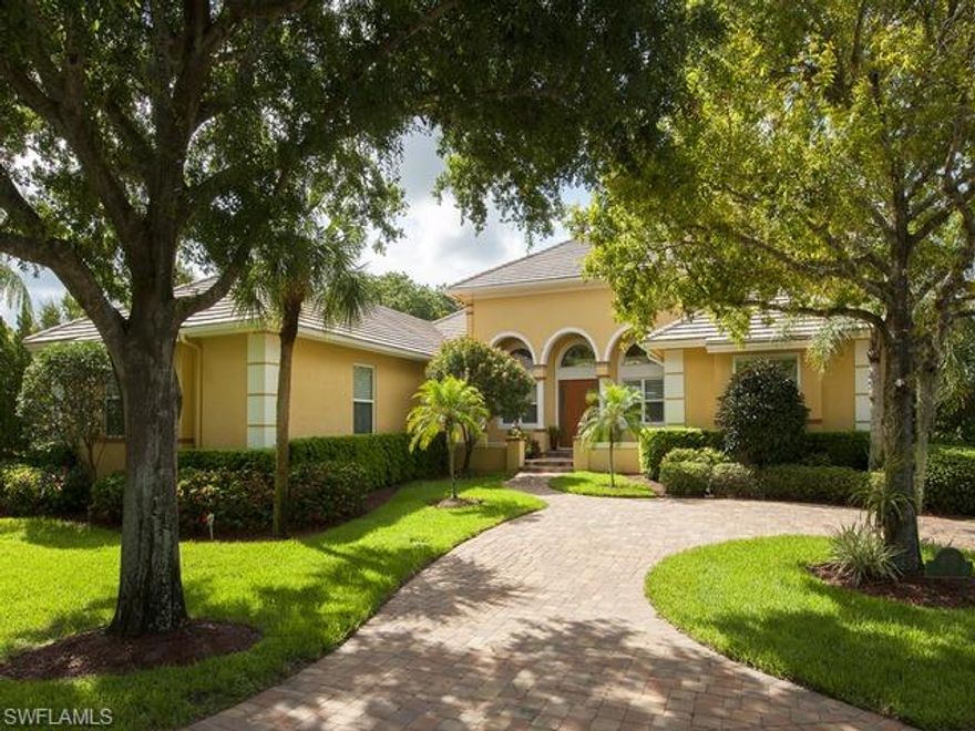 MOTIVATED SELLER. REDUCED $100,000. OVER $800,000 IN UPGRADES IN THIS entertainer's delight in a private setting like no other. Southern exposure on an oversized corner lot with four bedrooms, four-and-a-half baths, 4,580 square feet of living area with soaring ceilings overlooking two lakes. Expansive gourmet kitchen with intimate bar area, complete with ice maker and beverage refrigerator, with a full-service butler's pantry. Wine or reading room, fireplace, 50-foot lap pool, oversized two-car garage and hurricane windows with high-impact glass.