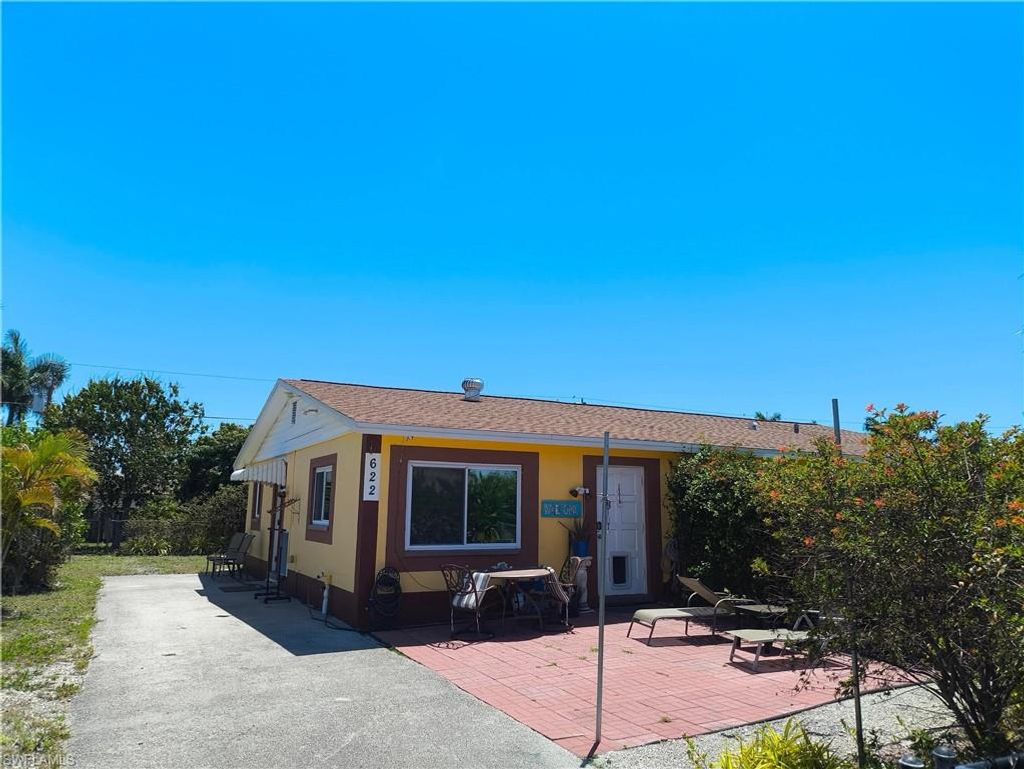 Photo of 618 107th AVE N, NAPLES, FL 34108 (MLS # 226017130)