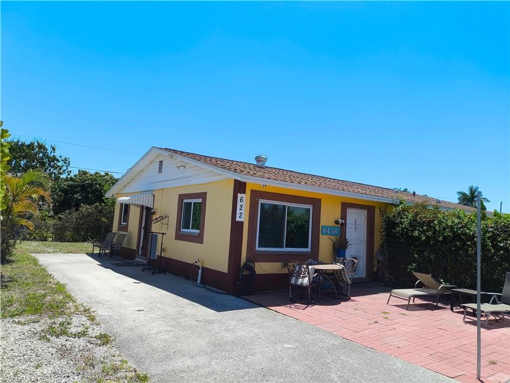 Photo of 618 107th AVE N, NAPLES, FL 34108 (MLS # 226017130)