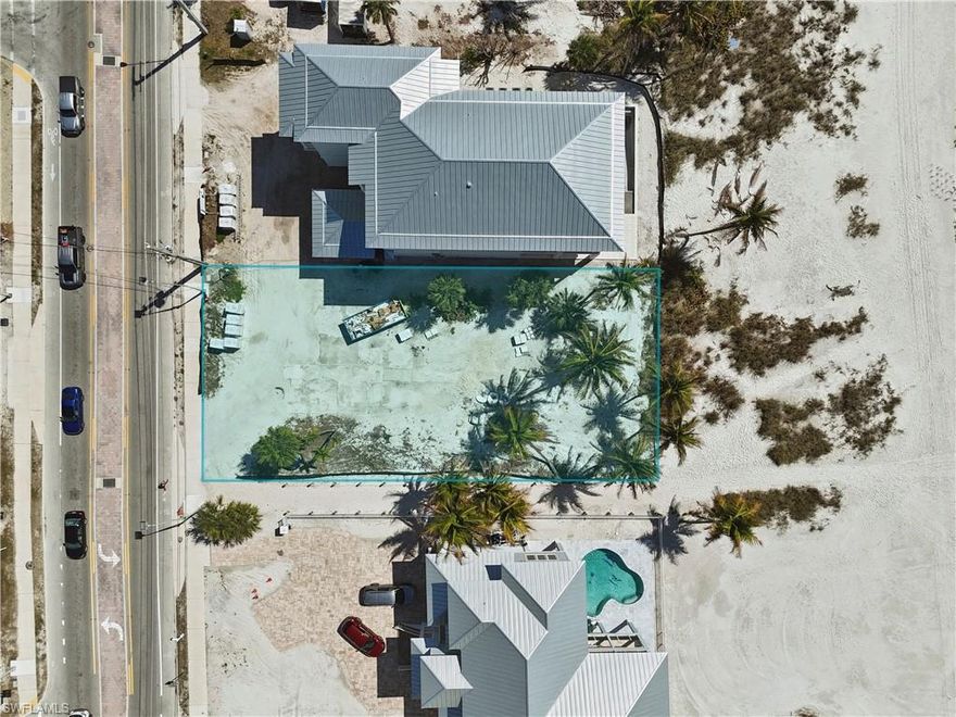 Unrivaled opportunity to claim your own stretch of paradise on Fort Myers Beach. Perfectly positioned mid-island along the Gulf’s renowned sugar-white sands and shimmering turquoise waters, this prime beachfront parcel offers the rare chance to design and build the coastal estate you’ve always envisioned.

Imagine mornings greeted by gentle Gulf breezes and the rhythmic sound of waves, followed by sun-filled days on the beach just steps from your door. Evenings bring breathtaking sunsets that paint the sky in brilliant hues, creating the perfect backdrop for relaxed coastal living and unforgettable gatherings with family and friends.

Ideally located within walking distance of Margaritaville Resort, Times Square, and an array of eclectic shops, restaurants, and entertainment, this exceptional property offers the best of both worlds—peaceful beachfront living with convenient access to the vibrant energy and amenities that define Fort Myers Beach.

With very limited opportunities remaining to build directly on the Gulf, this property represents far more than land—it’s the chance to create a legacy home along one of Southwest Florida’s most coveted shorelines. Whether you envision a private coastal sanctuary, a luxury vacation retreat, or a strategic long-term investment, this remarkable parcel is your canvas to bring that dream to life.

Claim your place in paradise and experience the lifestyle only Gulf-front living can offer.