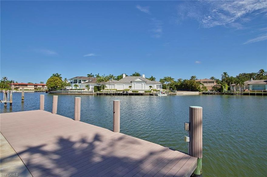 No bridge access to the Gulf, wide bay views and all just a short stroll to the Moorings Beach Park, this is the perfect place to build your Naples dream. Over 110 feet of water frontage, recently updated seawall in 2016/2017, and a lot depth of 170 make this a great buildable area for a well-received future floor plan. The current structure on the lot offers a clean four-bedroom home with two-and-a-half baths and could be utilized for a short time while in the designing phase. Centrally located with quick access to U.S. 41 and Gulf Shore Boulevard to downtown, this property will surely not last.