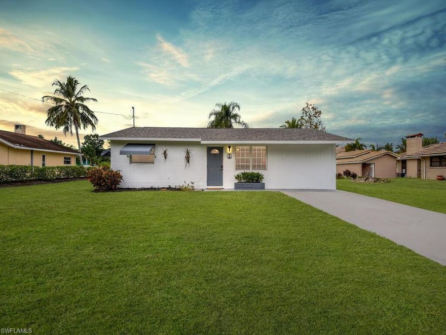 Welcome to the Pink Palace! This charming GULF ACCESS home was designed to be the life of the party, and welcomes all those that love to have fun! Bring your boat, kayaks, and paddle boards because this home is just around the corner from the Imperial River. The home features an inviting Florida room overlooking the water, an updated kitchen with a butlers pantry, a workshop, a spacious backyard with room for a pool, and a unique boat well that has potential to hold two boats. Fantastic location in the heart of Bonita Springs just minutes to Bonita beach, historic downtown Bonita Springs, Riverside park, and all the shopping and dining you can dream of. This home is currently used as a vacation rental and is being sold turnkey furnished.