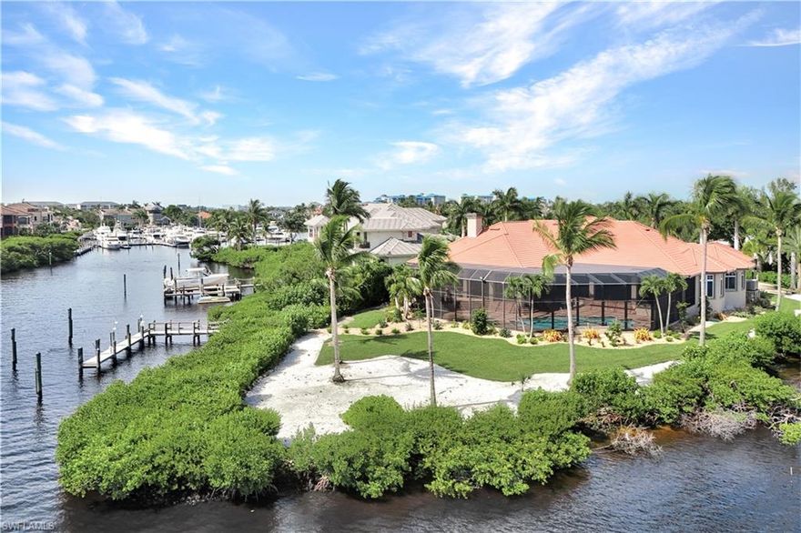 Rare opportunity to own this stunning custom home built by The Wolter Group. With just under an acre of land, this residence is located in the prestigious, gated, yachting community of St. Charles Harbour- A yachter's paradise.

A point lot on the coveted Waite Island Dr., this home boasts over 256ft on the river and has a private deeded deepwater dock, NO bridges to the gulf, that can accommodate up to a 70-foot yacht. Designed for privacy, livability and serene beauty, this home has approximately 6142 sq ft under air and 13026 total square ft of beautiful living space. All impact windows and doors, new roof, new generator, new HVAC’s, a salt pool with all new pool equipment, a 3 car airconditioned garage- this residence is move right in and enjoy the SWFL yachting lifestyle!

15740 Waite Island Dr. is thoughtfully designed with soaring ceilings and custom woodwork, mahogany entry doors, oversized windows and sliders - all to take in those magnificent views. With 4 bedrooms and 5 ½ baths, this residence features a dreamy Chef’s kitchen with Wolf gas range and pot filler, wolf double ovens, walk in pantry, custom cabinetry, wine refrigeration, and subzero refrigerator/ freezer. The kitchen opens up to the expansive family room with a custom coquina fireplace, a large breakfast room and again... those one-of-a-kind endless water views!!

A sprawling primary suite on the first-floor features water views out of every window, a sitting area, his and her sinks, custom walk-in closets, soaking tub, and a large expansive shower.  This home also features a formal living room, dining room, office, 2 first floor guest rooms + 4th bedroom/media room all en-suite. Extra airconditioned storage, gym, expansive screened in covered lanai, outdoor kitchen, all with spectacular endless water and sky views. Custom plantation shutters and sound system throughout.

Amazing opportunity to have this dockage right out your back door! No other property combines this exceptional custom home, unique waterfront location and deepwater private yacht dockage. Yacht Club membership available at the St. Charles Yacht club that features a full-service marina, pool, tennis, and waterfront dining.