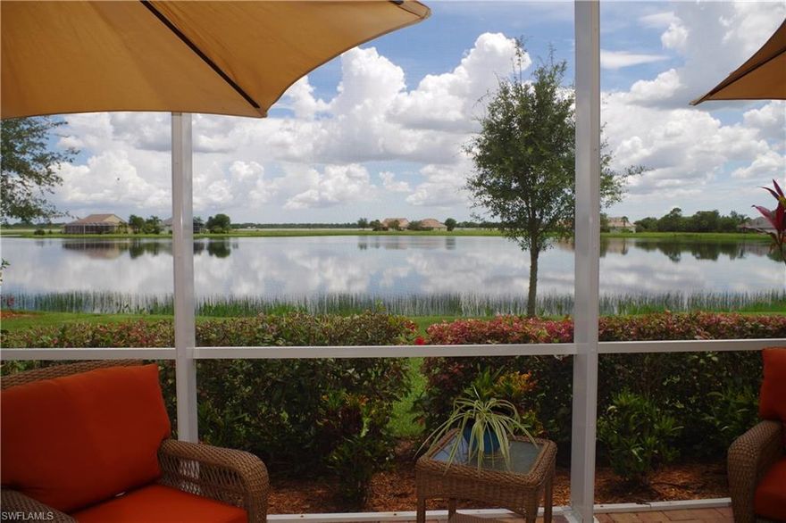 Incredible wide open water views from arguably the BEST LAKEFRONT lot in Cascades at River Hall!  This 2 BR + Den, 2 Bath, 2 Car Garage Home boasts a light & bright open floorplan with VAULTED ceilings and 2 sets of sliders to the extended, screened, pavered Lanai.  Neutral tile & paint, wood cabinets, granite counters & glass tile backsplash, walk-in Master Shower & approx. 1900 sq. ft of living area are just a few great features!  This home is an extended version of the "Estuary" design;  Hurricane impact windows, spacious foyer, screened front porch with pavers, extra storage in garage, & ADT security system.  Cascades is a 55+ gated community just minutes east of I-75; the Cascades Clubhouse opened February 2017 and offers a heated pool & spa, outdoor BBQ, Gathering Room with Kitchen, gym, and yoga room.  There are also Bocce, Pickleball, & Har-Tru Tennis Courts.  Low HOA fees $295/mo include amenities, lawn maintenance, irrigation, bundled basic cable & internet & security. Golf memberships at River Hall Country Club & the Davis Love III 18 Hole Champion Golf Course available. Why wait to build when you can enjoy your BETTER than new home NOW! Seller offering AHS Home Warranty