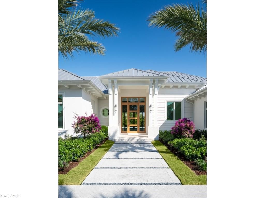 Photo of 725 Pectin RD, NAPLES, FL 34102 (MLS # 226012695)