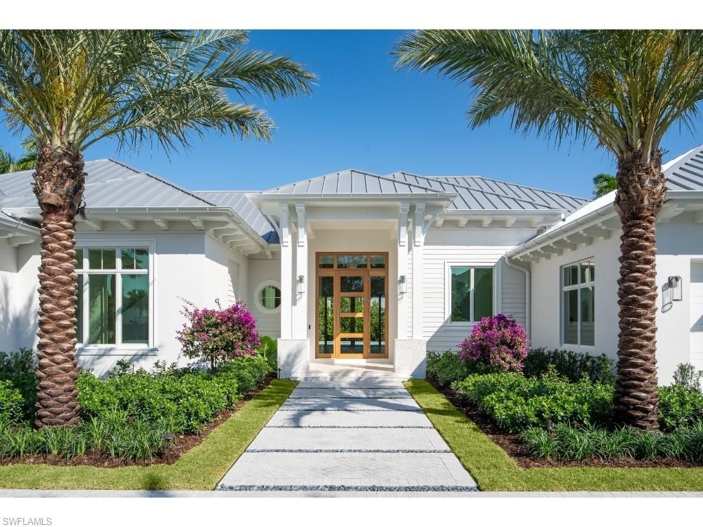 Photo of 725 Pectin RD, NAPLES, FL 34102 (MLS # 226012695)