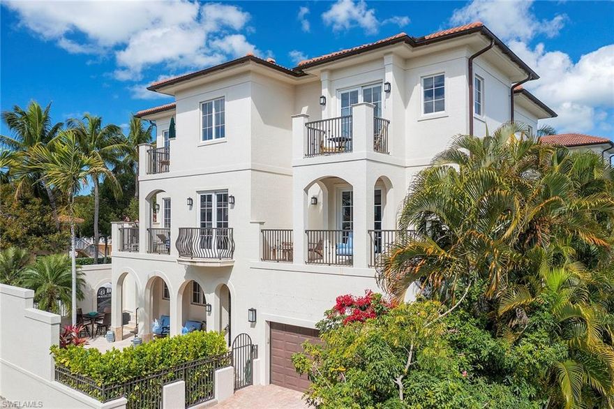 Located just steps from Fifth Avenue, this gorgeous three-story villa features a private pool and spa and multiple terraces on every floor with western and southern views. With over 3,200 square feet, this three-bedroom-plus-den home includes a private elevator, gas fireplace, wood and tile floors throughout and a private garage with alley access. The kitchen boasts stunning Arctic Ice granite countertops and center island with Sub-Zero and Wolf appliances. Custom-designed window treatments accentuate the beautiful master suite and third-floor guest room, while the elegant master bath is complemented by a spacious walk-in shower with Carrera marble and a separate bathtub. Enjoy downtown Naples living at its finest with the Gulf of Mexico just five blocks away.